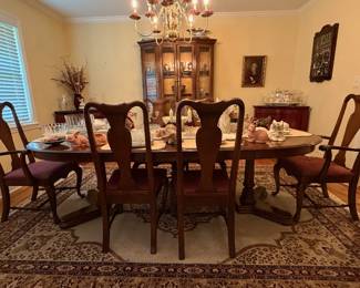Wide-angle view of dining room featuring Ethan Allen furniture.