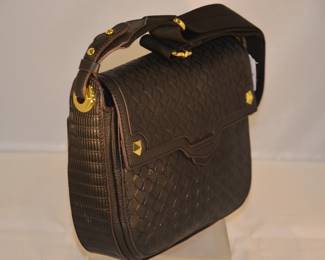Side View of the New Oryani Black Handbag with Shoulder Strap