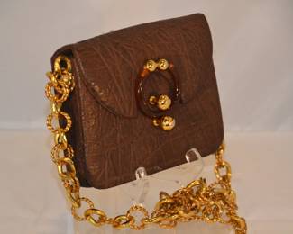 Side View of the Brown and Gold Tone Shoulder Bag