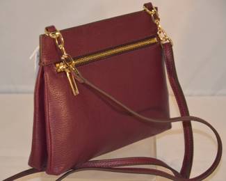 Side View of the New G.I.L.I Duel Pocket Handbag
