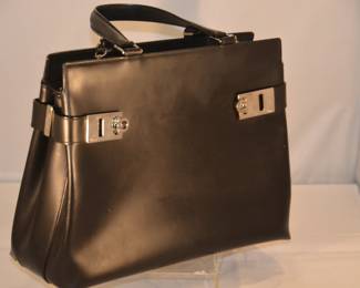 Side View of the Salvatore Ferragamo Smooth Black Leather Handbag/Tote