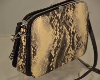 Side View of the Three Sections of the Oryani Handbag