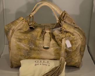 New G.I.L.I Oversized Leather Tote Features a Metalic Snackskin Print. Includes Dust Cover and COA