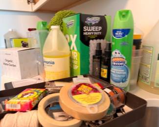 Household cleaning supplies and tape