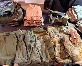 Military camo uniforms, duffel bags, and field gear lot