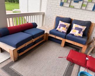 Wood patio sectional with navy cushions