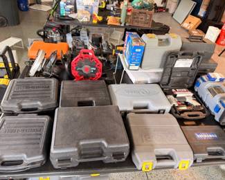 Power tools in cases, saws and drills lot