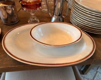China set with brown rim band, plates and bowls