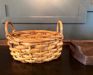 Woven wicker basket with handles