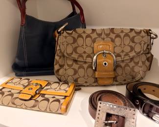 Coach signature handbags, wallets, and leather belts