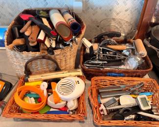 Baskets of kitchen utensils and gadgets