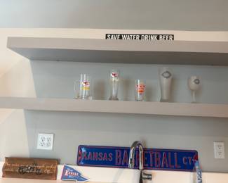 Sports team beer glasses and bar signs