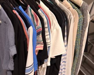 Closet of blouses, tops, and sweaters