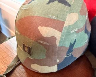 Military helmet with camo cover