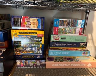 Assorted jigsaw puzzles, various brands