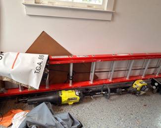Extension ladder and DeWalt power tools