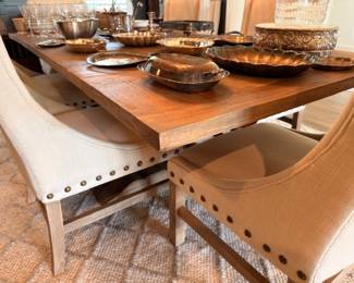 Wood dining table with linen nailhead chairs