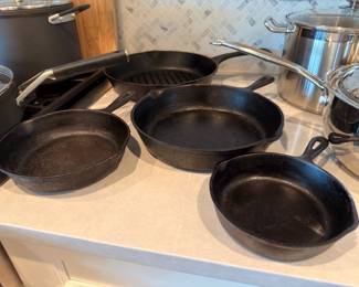 Cast iron skillets and stainless steel cookware