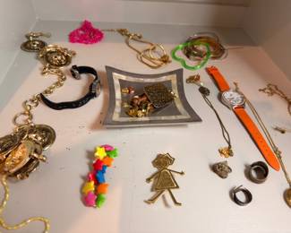 Assorted costume jewelry, watches, and brooches