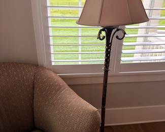 Wrought iron floor lamp with bell shade