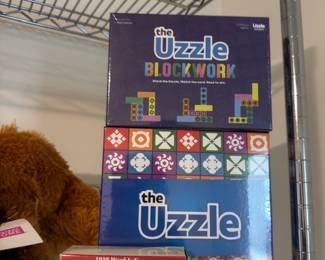 Uzzle puzzle game and die-cast fire truck model