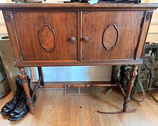 Antique carved wood radio phonograph cabinet