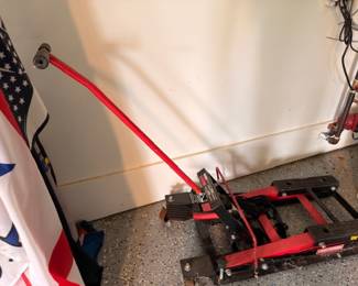 Red hydraulic motorcycle jack lift