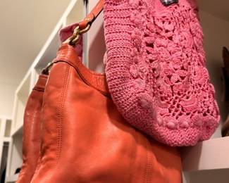 Orange leather and pink crochet shoulder handbags