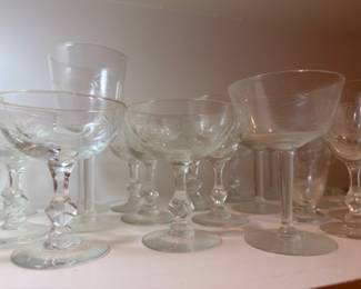 Vintage crystal champagne coupes and wine glasses