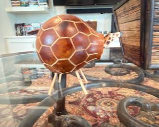Carved wood bird sculpture, front view