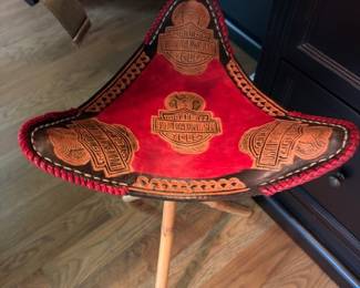 Harley-Davidson tooled leather three-legged stool, red top
