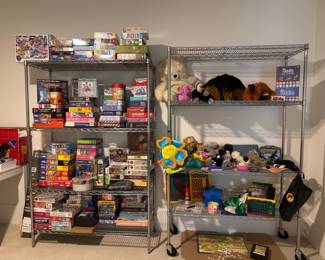 Shelves of board games, puzzles, and toys