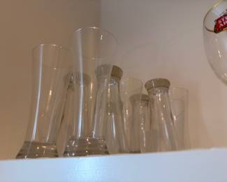 Beer pilsner glasses including Stella Artois