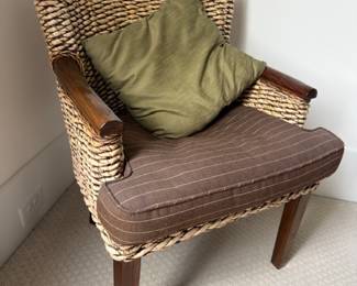 Woven rattan accent chair with cushion