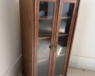 Wood display cabinet with glass doors