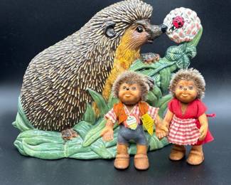 193 CastIronHedgehogDoorstopwithSteiffMeckiHedgehogDolls