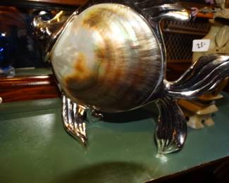 This is a "CHell" Fish - Clam Shell BOcy w/ Face, Fins and Tail of Chrome (about 8 " )
