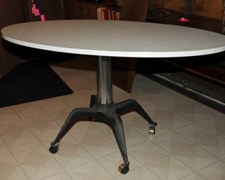 OVAL PEDISSTAL TABLE ON WHEELS