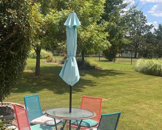 outdoor umbrella and dining set