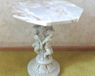 Lot 115: Octagon Marble Top Plant Stand with Cherubs Plaster Base