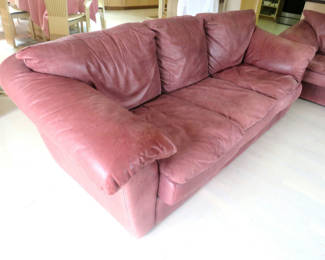 Lot 26: Leather tech garnet leather couch