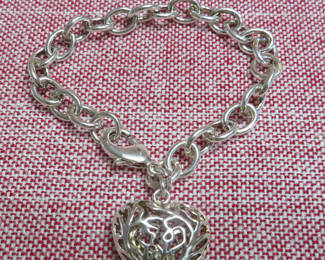 Lot 51: Sterling Silver Heart Pendant Bracelet