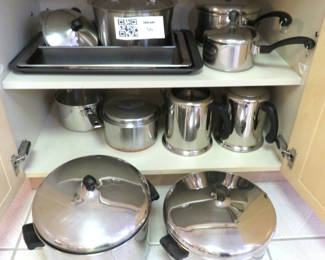 Lot 56: Two Shelves Farberware Pots Other Cookware and Bakeware