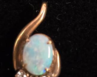 14k charm with small opal