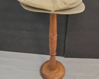 vintage hat stand with a hat