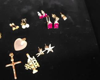 gold earrings and charms