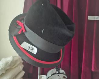 awesome hat with stand , sold separately 
