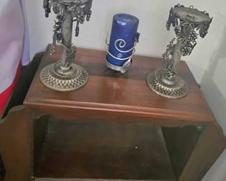 magazine cabinet and candelabras