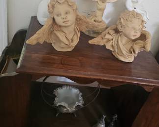 cherub and a vintage cabinet