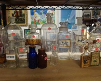 Collection of antique pharmacy bottles